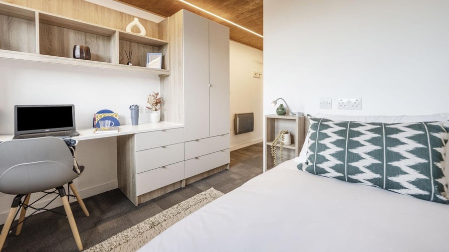 Desk laptop chair wardrobe bed with pillow bedroom at Gillows in Lancaster Student Accommodation