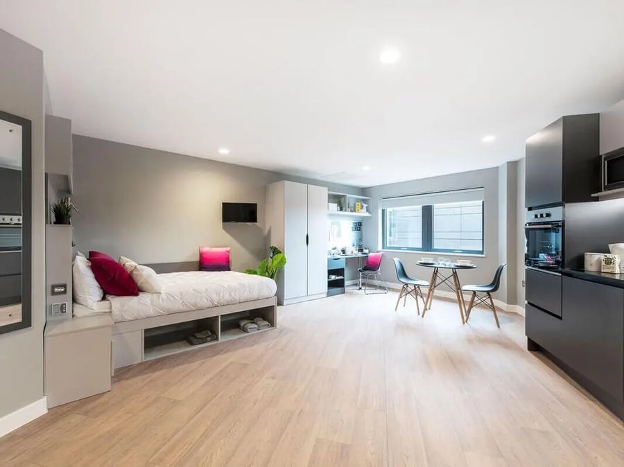 Bed desk and kitchen studio apartment at Clifford House in Exeter Student Accommodation