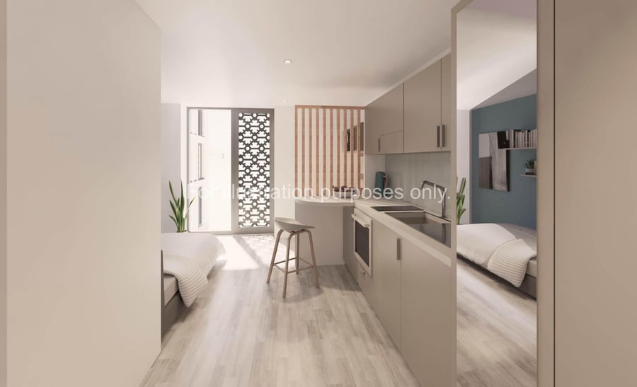 Beds kitchen island stool kitchen studio apartment at St Gabriels in Manchester Student Accommodation