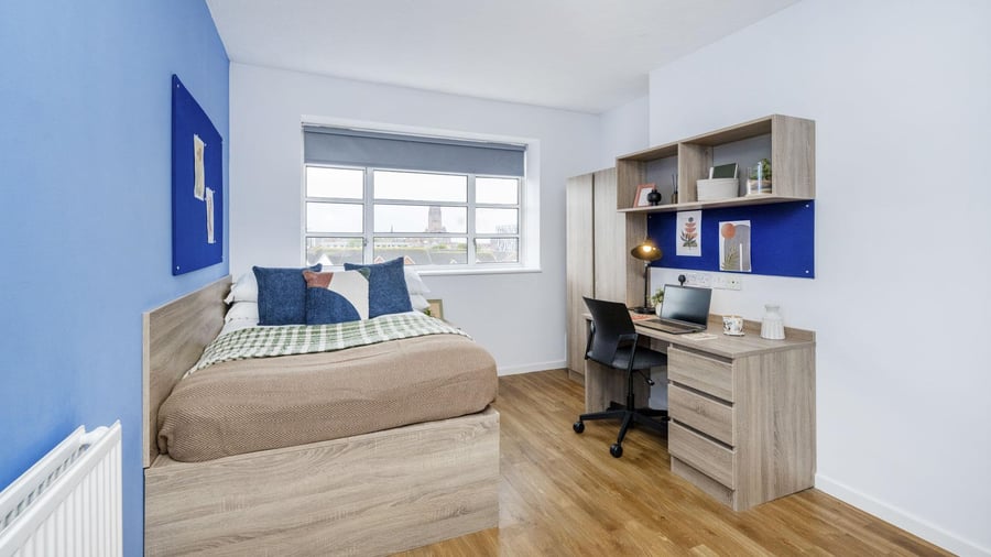 Bed desk wardrobe with laptop and decorations bedroom at St Andrews Gardens - Liverpool in Liverpool Student Accommodation