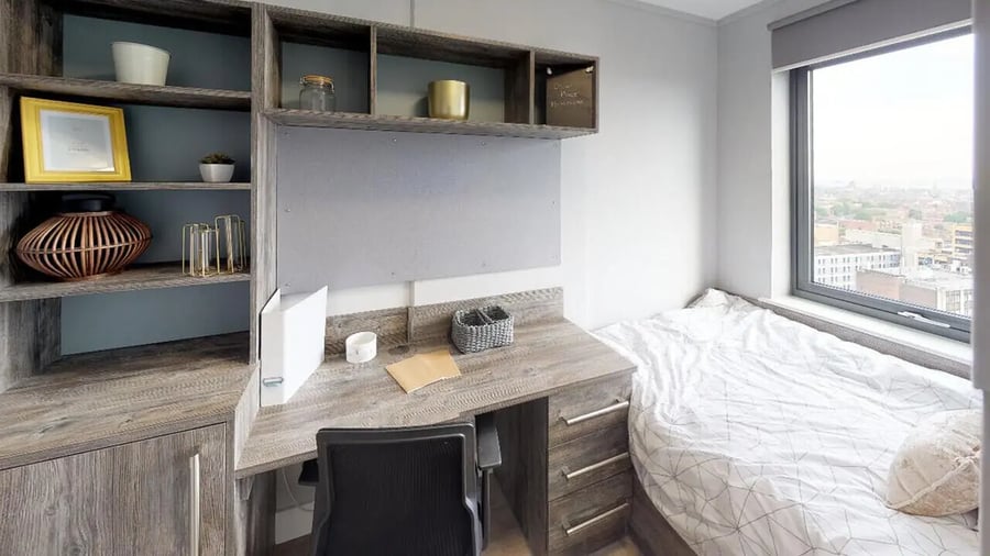 Desk shelves bed and window view bedroom at Collegiate Crown Place Portsmouth in Portsmouth Student Accommodation