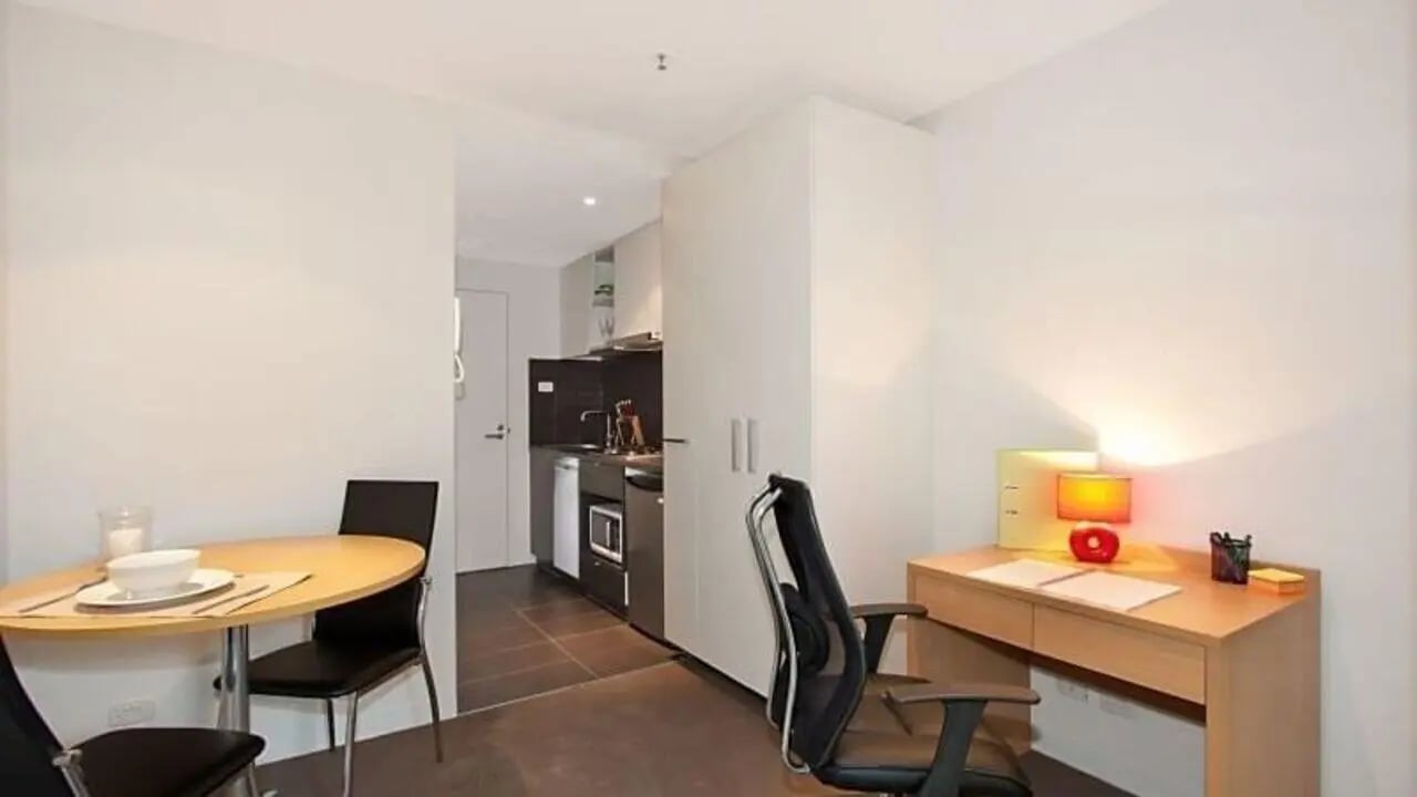 Desk chairs kitchen table and chairs study area at Student Living on Villiers in Melbourne Student Accommodation