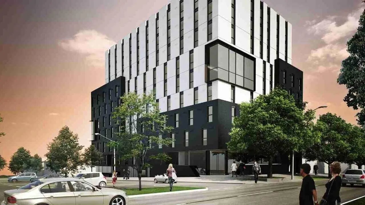 Modern building with cars and people exterior at Student Living on Villiers in Melbourne Student Accommodation