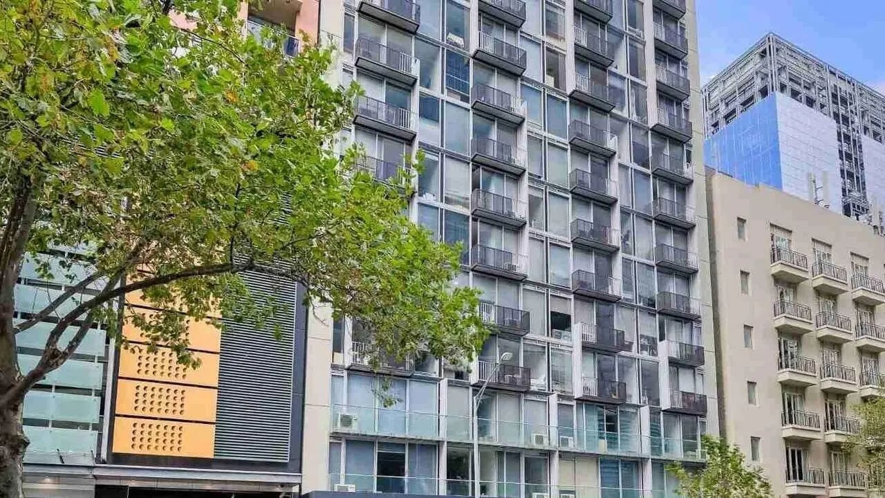Modern apartment building with many balconies exterior at Student Living on Lonsdale in Melbourne Student Accommodation