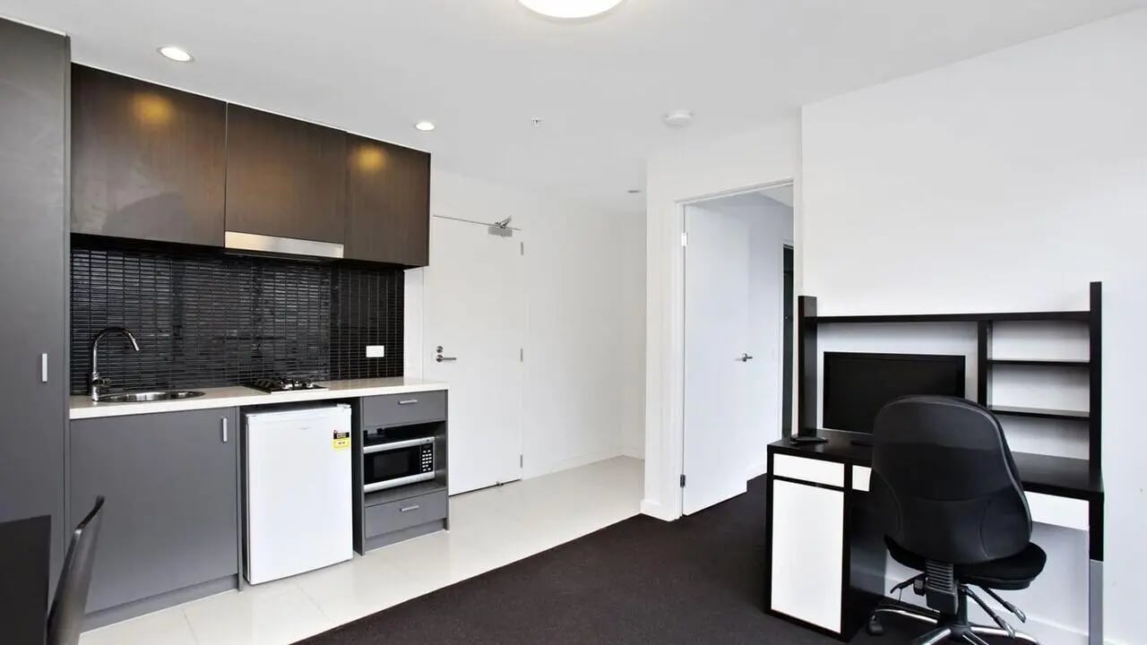 Kitchenette with desk and computer study area at Student Living on Raleigh in Melbourne Student Accommodation