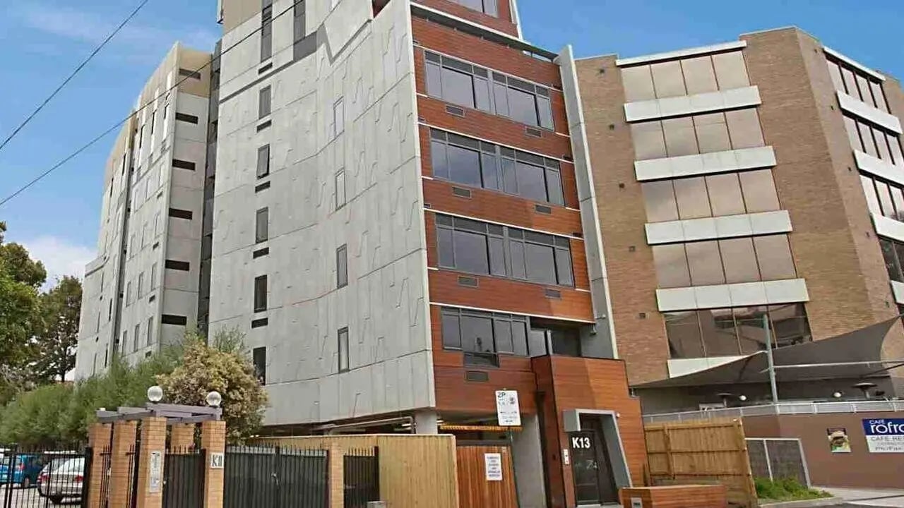 Modern building with multiple windows exterior at Student Living on Raleigh in Melbourne Student Accommodation