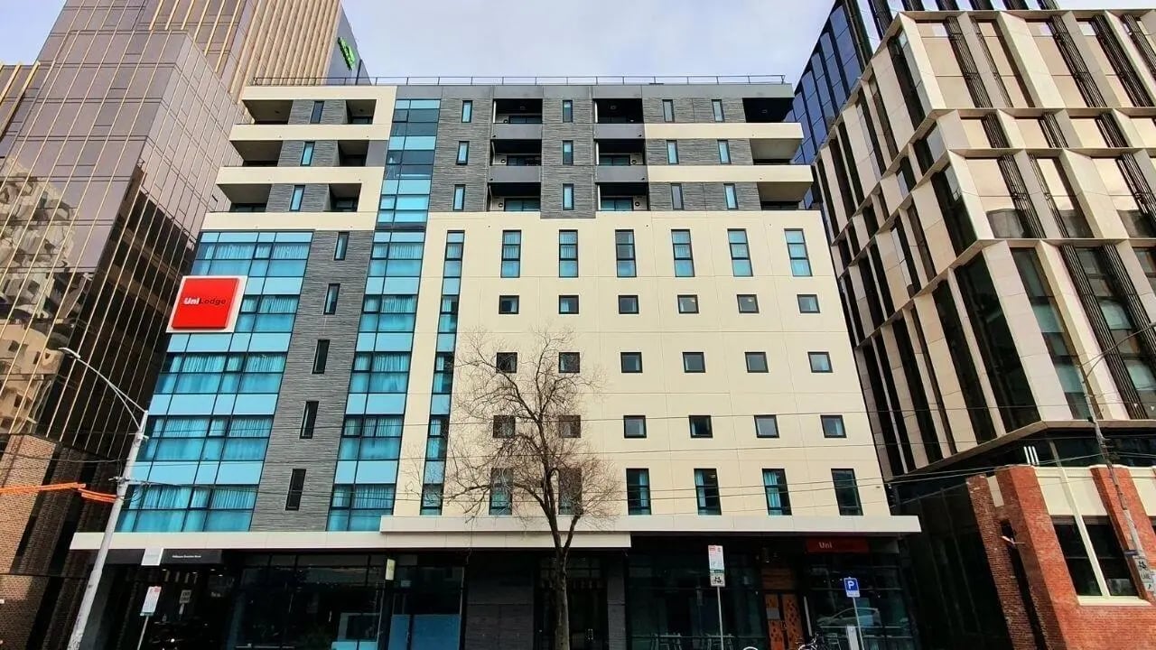 Uni Lodge building with blue windows exterior at UniLodge Carlton in Melbourne Student Accommodation