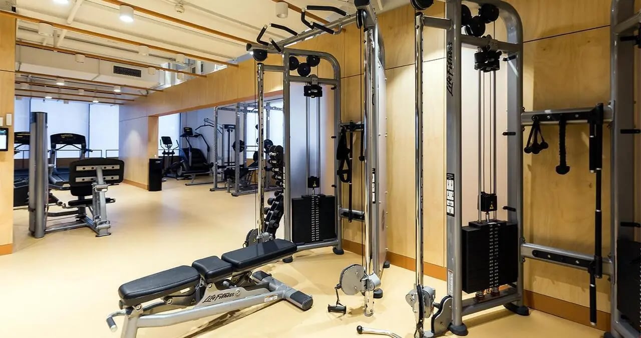 Gym equipment and treadmills fitness room at Iglu Central in Sydney Student Accommodation