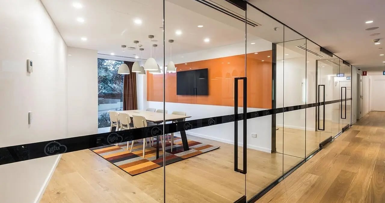 Conference room with table chairs and screen meeting room at Iglu Chatswood in Sydney Student Accommodation