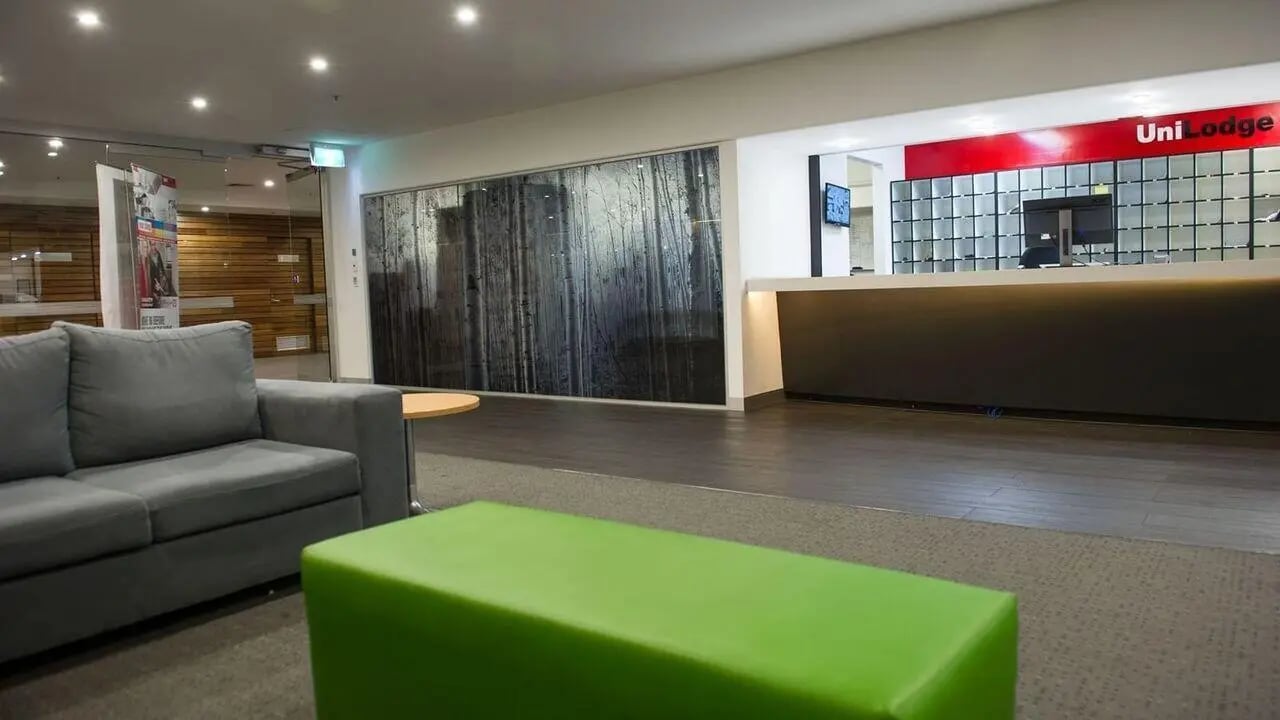 Sofa green bench reception desk lounge at Student Living-339 Swanston in Melbourne Student Accommodation