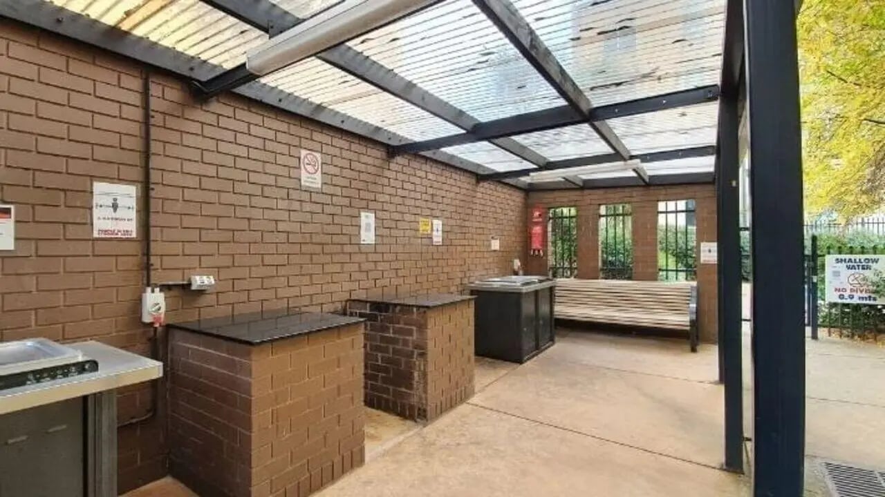 Brick BBQ area with benches and sink BBQ area at Student Living - 570 Lygon in Melbourne Student Accommodation