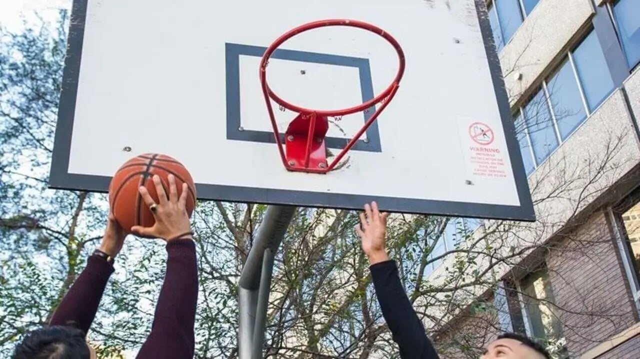 Basketball game with hoop and students playing area at Student Living - 570 Lygon in Melbourne Student Accommodation