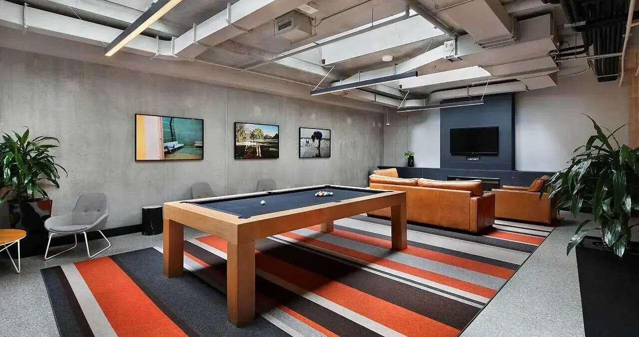 Pool table sofas television lounge area at Iglu Melbourne City in Melbourne Student Accommodation