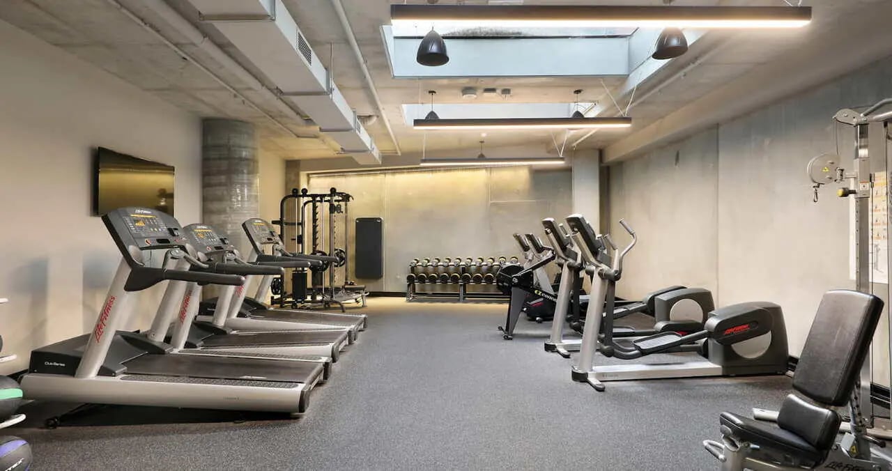 Treadmills ellipticals and weight machines gym at Iglu Melbourne City in Melbourne Student Accommodation