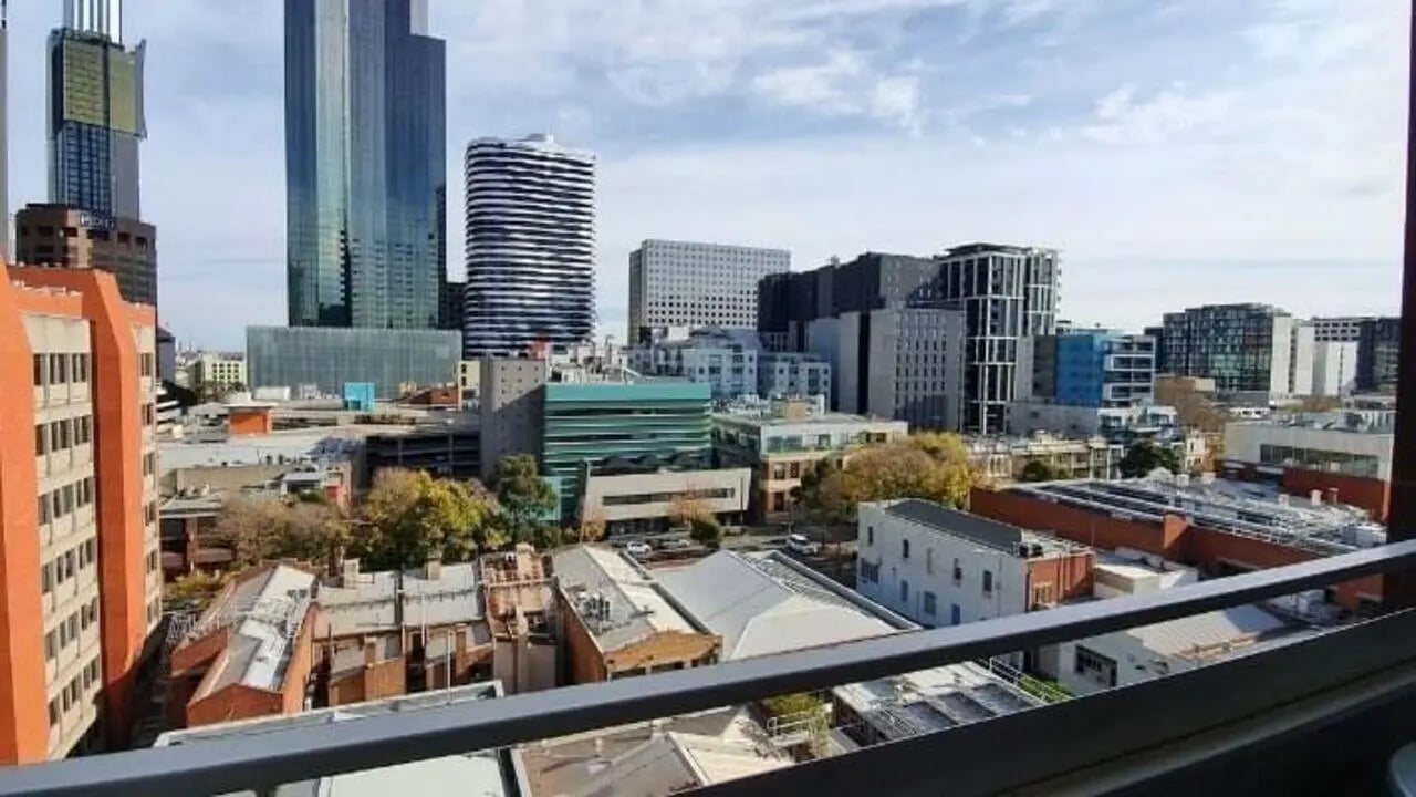 Cityscape view from balcony with modern buildings exterior at Student Living D2 in Melbourne Student Accommodation