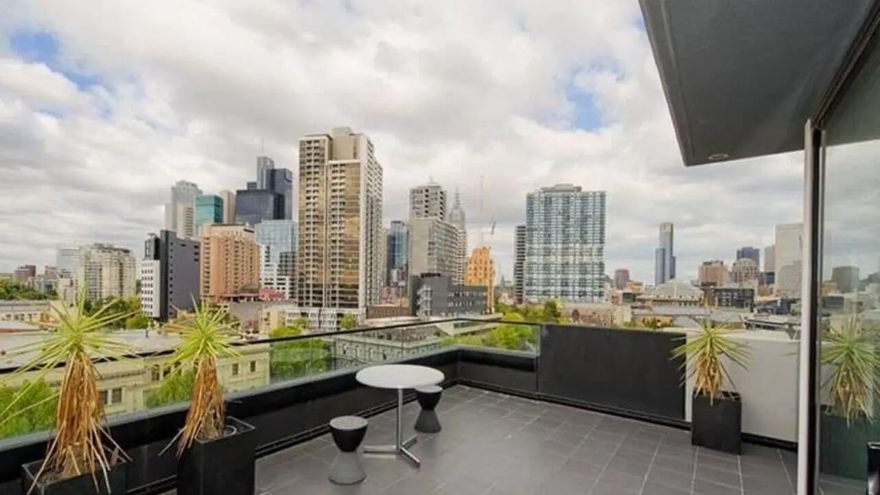 Balcony with seating and plants exterior at Student Living D2 in Melbourne Student Accommodation