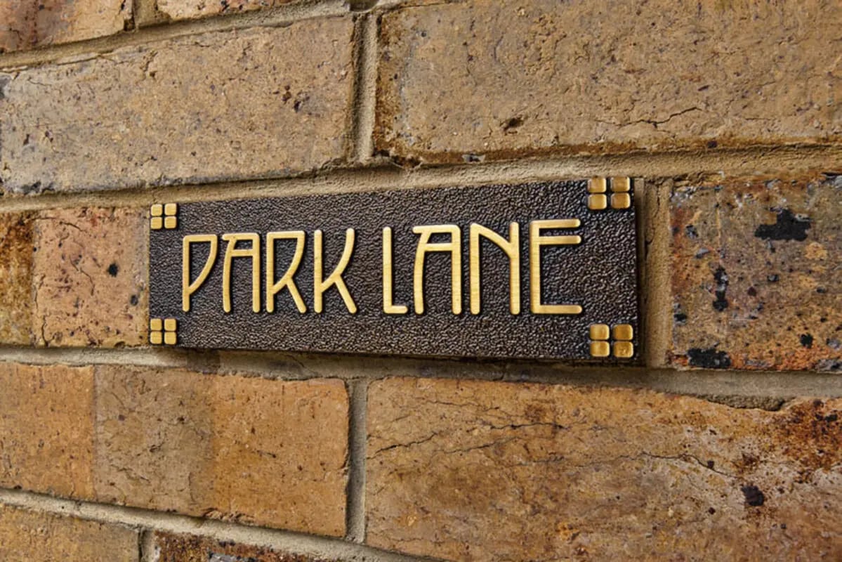 Park Lane nameplate on brick wall Exterior at Park Lane House in Melbourne Student Accommodation