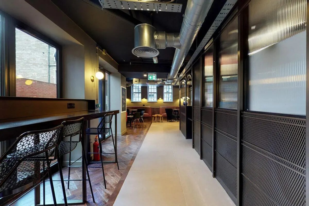 Bar with chairs and seating area communal space at Haymarket Edinburgh in Edinburgh Student Accommodation