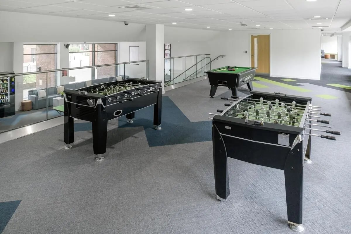 Foosball tables and pool table playing area at St James Glasgow in Glasgow Student Accommodation