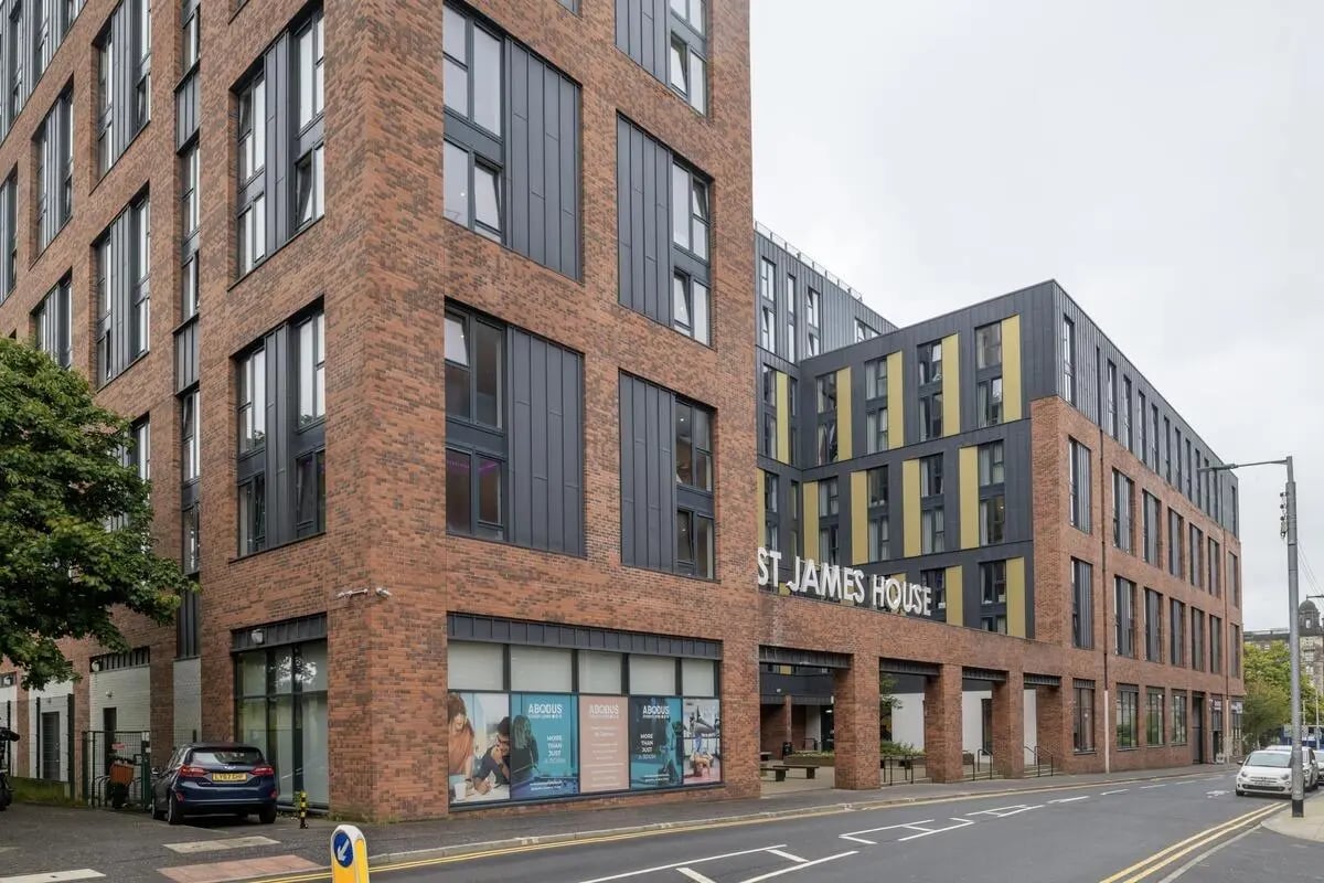Modern brick building with St James House sign exterior at St James Glasgow in Glasgow Student Accommodation