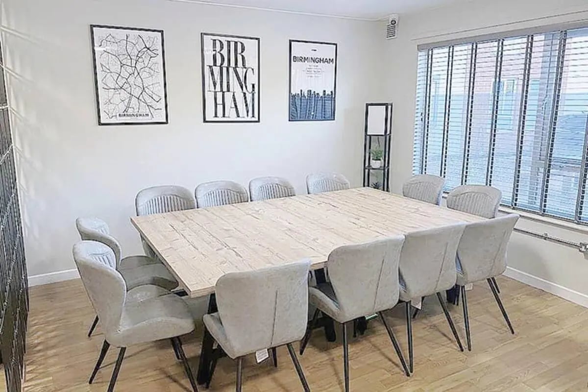 Large table with chairs artwork and window dining room at Metchley Hall in Birmingham Student Accommodation