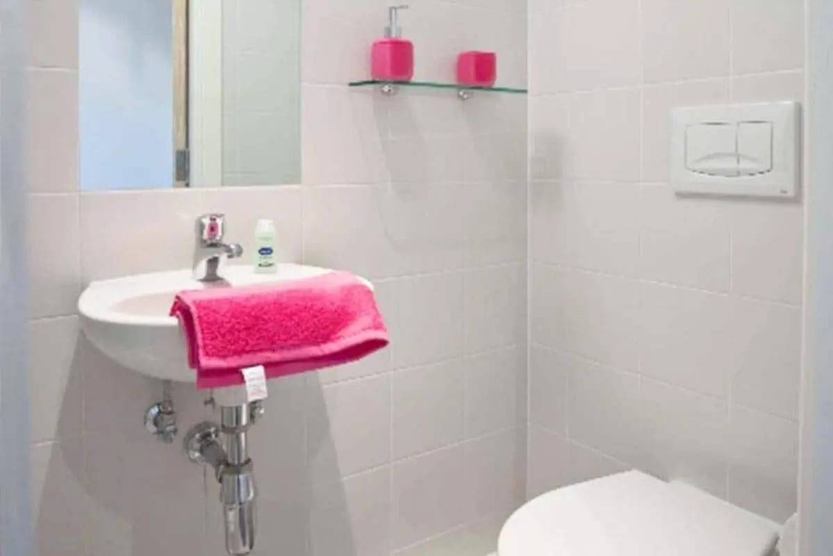 Sink toilet pink towel bathroom at Edinburgh College Residences in Edinburgh Student Accommodation