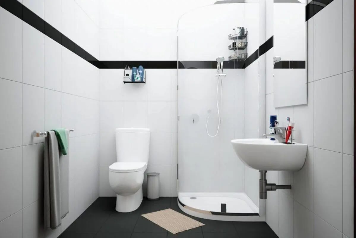 Toilet sink shower with towels and toiletries bathroom at City Edge - Manchester in Manchester Student Accommodation