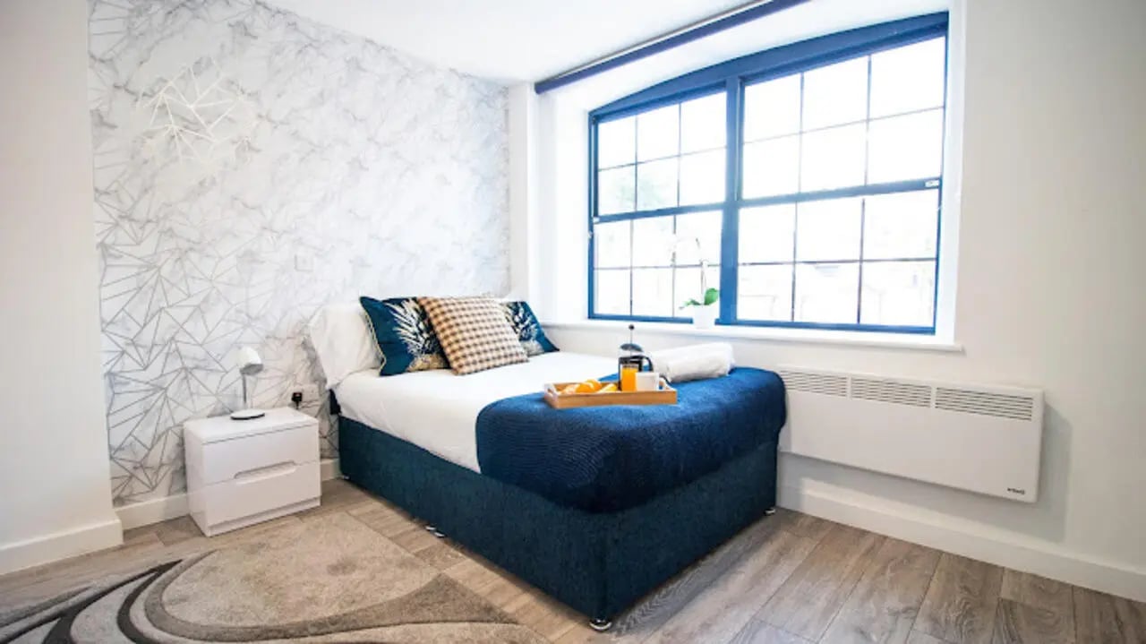 Bed with tray window heater bedroom at Stanley House Nottingham in Nottingham Student Accommodation