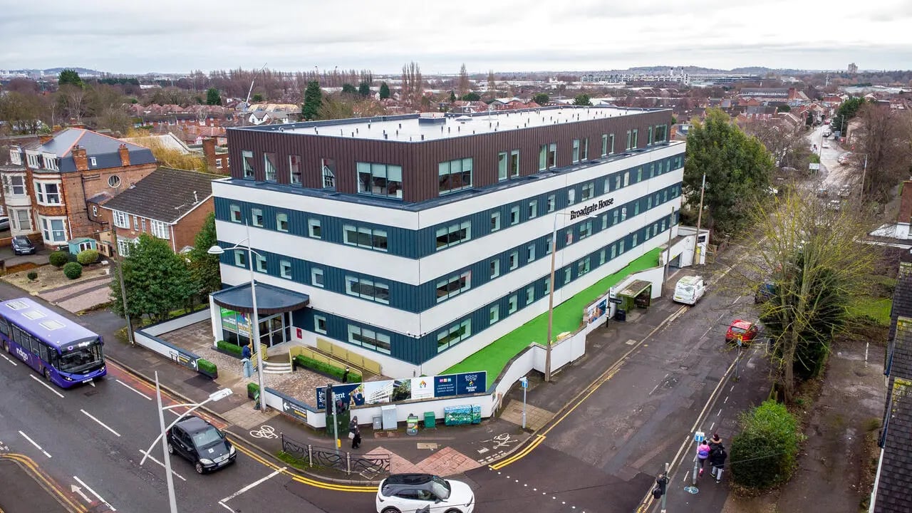 Broadgate House student accommodation exterior with bus and cars exterior at Broadgate House Student Living in Nottingham Student Accommodation
