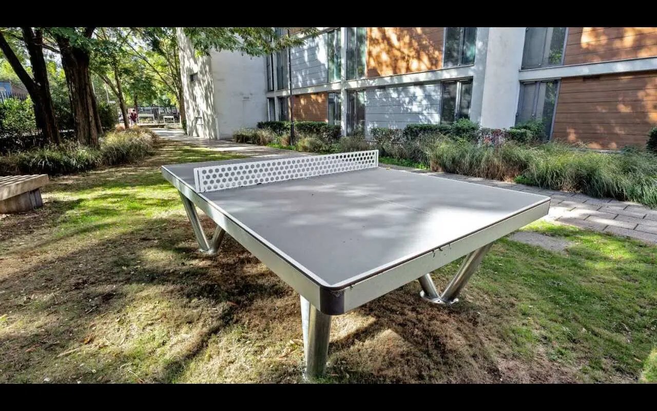 Outdoor ping pong table with benches playing area at Griffon Studios in London Student Accommodation