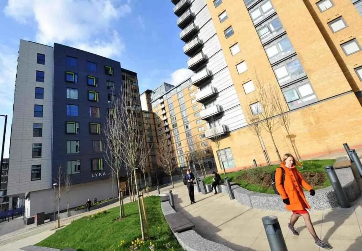 Modern apartment buildings with a walkway exterior at The Lyra in London Student Accommodation