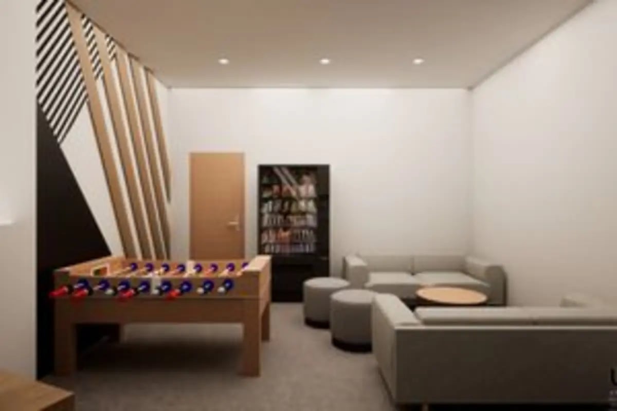 Foosball table sofa vending machine lounge area at The Orchard in Leicester Student Accommodation