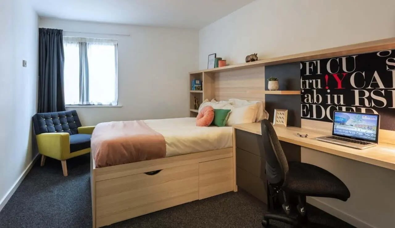 Bed desk chair armchair window bedroom study area at The Arch - Liverpool in Liverpool Student Accommodation
