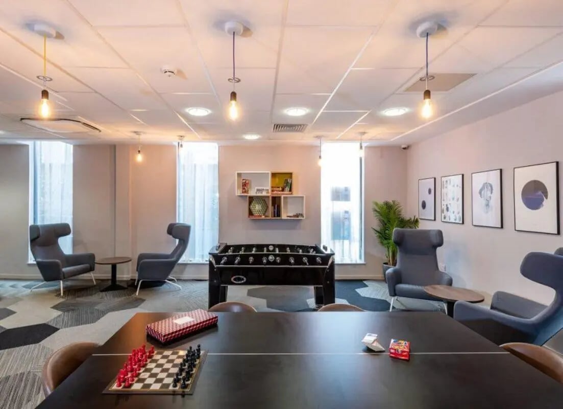 Foosball chess chairs and table living room at The Electra in Liverpool Student Accommodation