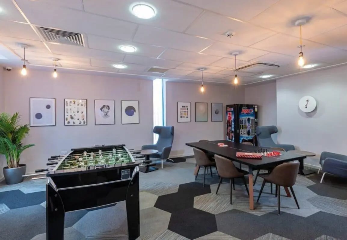 Foosball table chairs vending machine common room at The Electra in Liverpool Student Accommodation