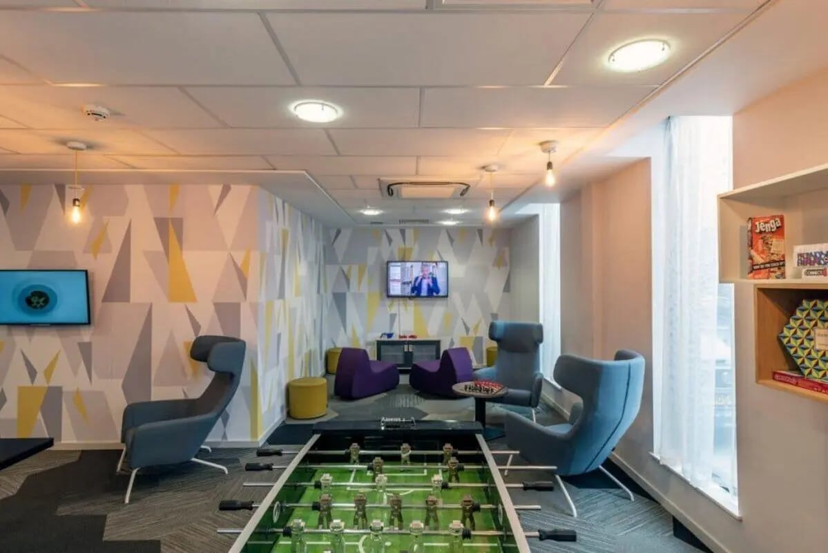 Foosball table chairs televisions games Jenga playing area at The Electra in Liverpool Student Accommodation