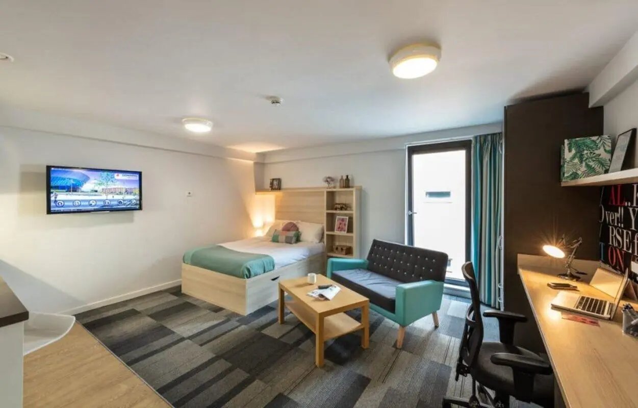 Bed sofa desk and TV bedroom at The Electra in Liverpool Student Accommodation