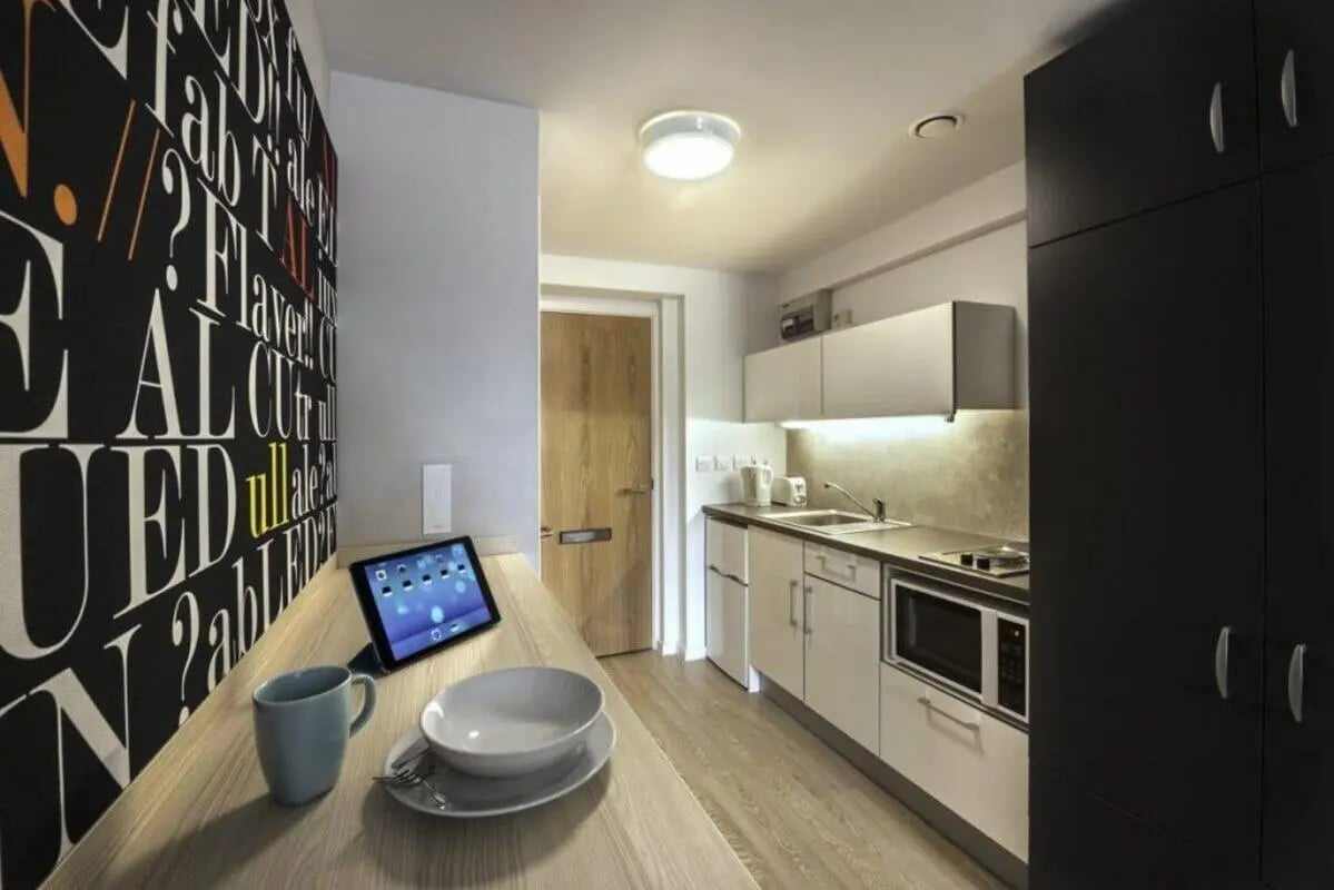Tablet mug bowl and kitchen counter kitchen at The Electra in Liverpool Student Accommodation