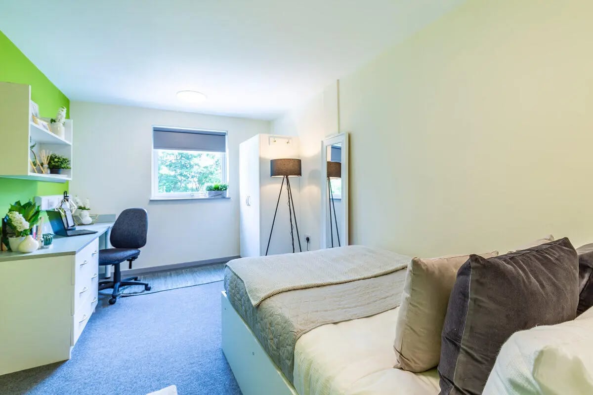 Desk chair laptop window and bed bedroom at Bryson Court in Newcastle Upon Tyne Student Accommodation