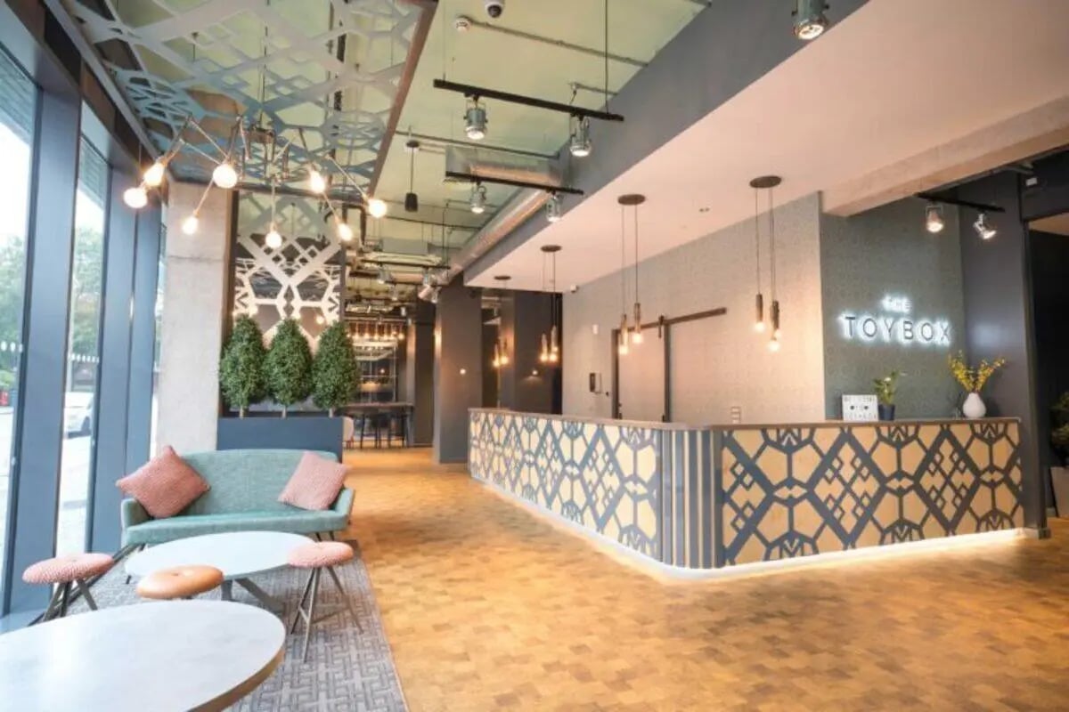 Sofa tables and reception desk reception area at The Toybox in Birmingham Student Accommodation