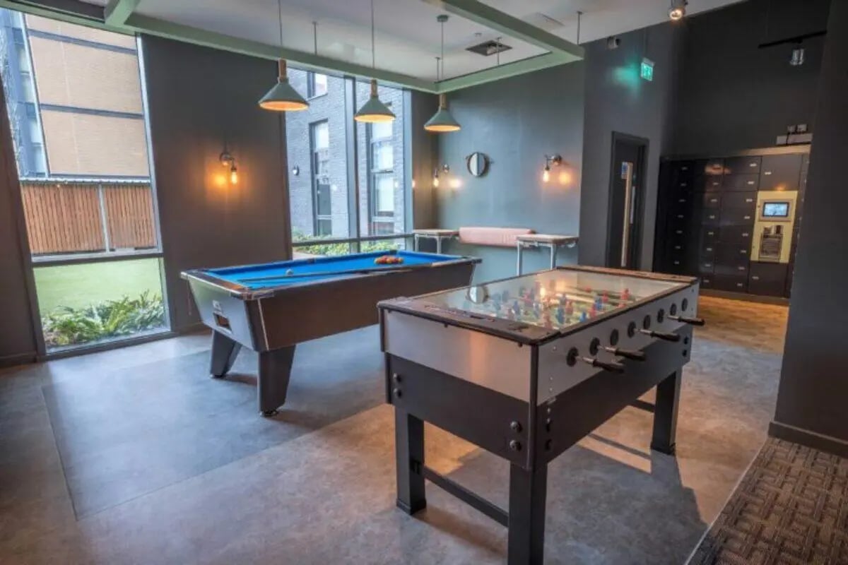Pool table foosball table lockers communal area at The Toybox in Birmingham Student Accommodation