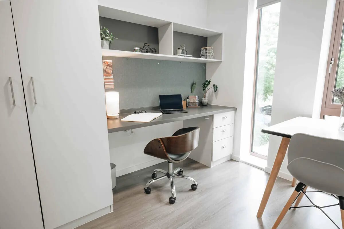 Desk with laptop chair and storage study area at Alma Court in Canterbury Student Accommodation