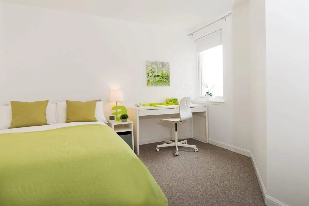 Bed desk lamp and chair study area at Trinity Court in Aberdeen Student Accommodation