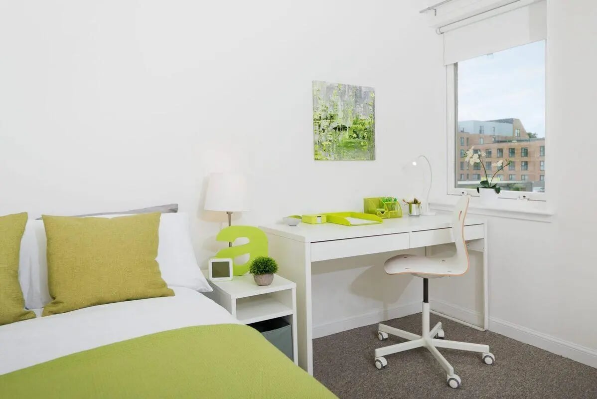 Bed desk lamp and chair bedroom study area at Trinity Court in Aberdeen Student Accommodation