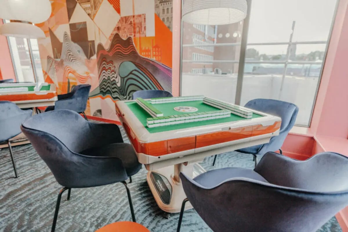 Mahjong table with chairs playing area at Bailey Fields -Sheffield in Sheffield Student Accommodation
