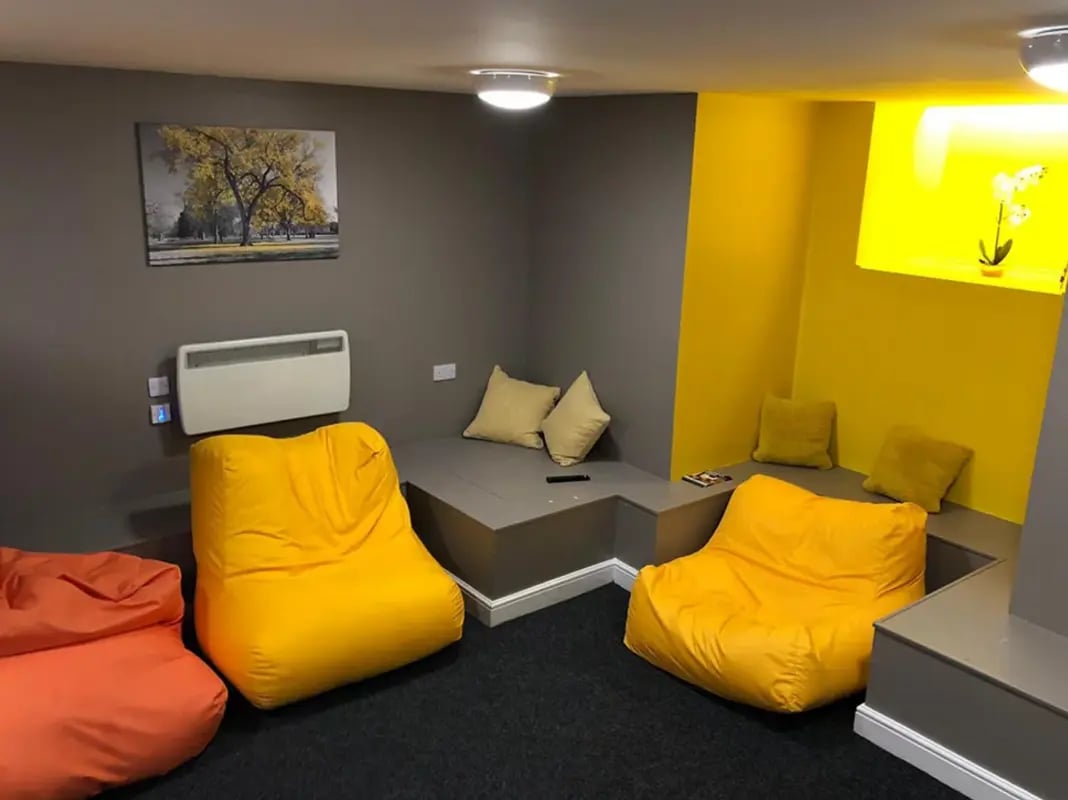 Bean bags and built-in seating lounge area at Regent Road in Leicester Student Accommodation