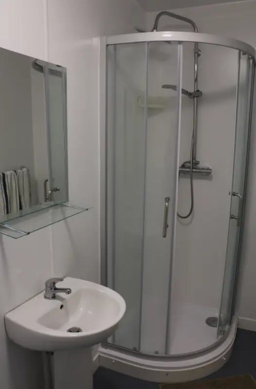 Sink with faucet and shower enclosure bathroom at Regent Road in Leicester Student Accommodation