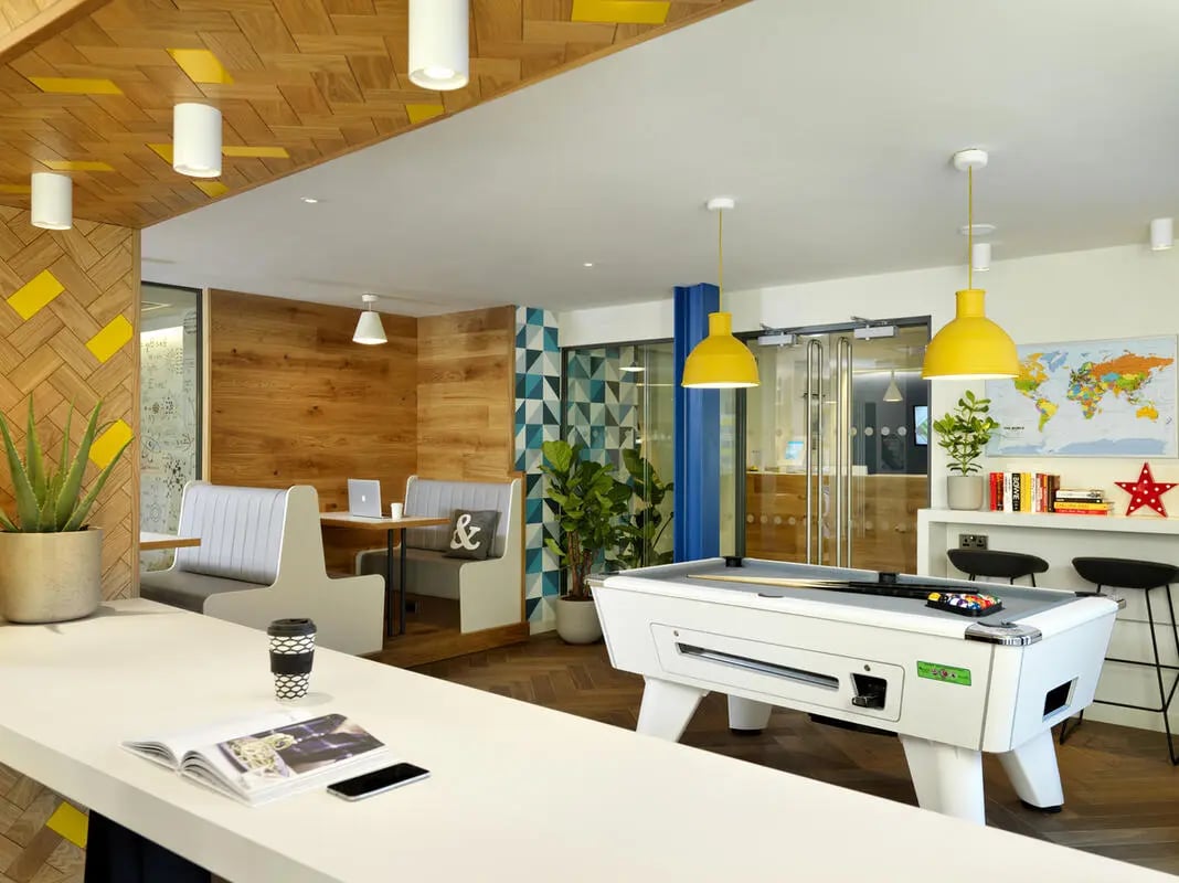 Pool table booths and plants communal area at Student Castle Edinburgh in Edinburgh Student Accommodation