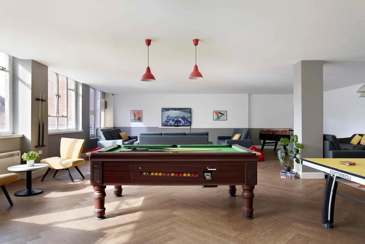 Pool table, sofas, and ping pong table lounge at Central Point in Plymouth Student Accommodation