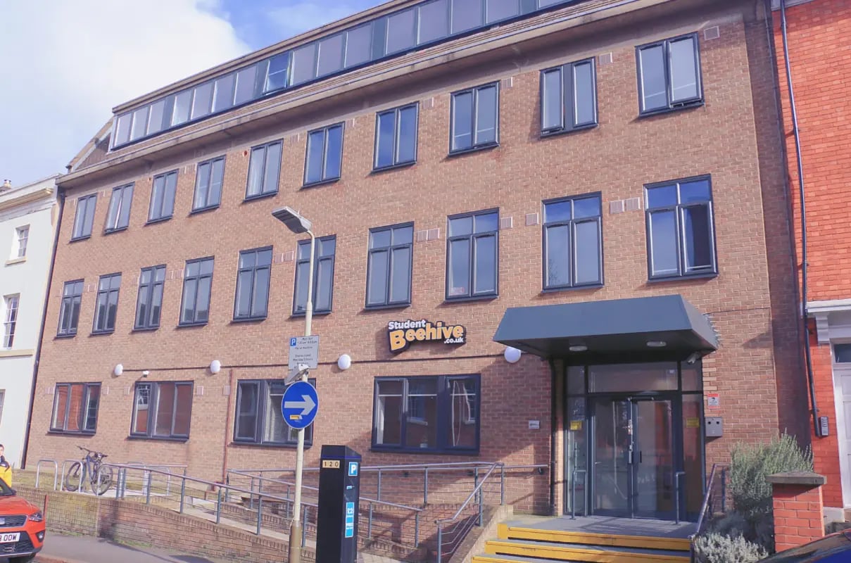 Brick building with many windows exterior at Renaissance House in Leicester Student Accommodation